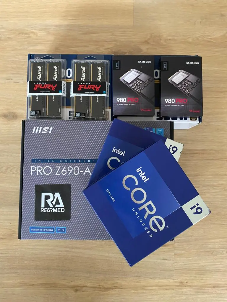 Boxed Rearmed build parts: i9-13900K CPUs, MSI PRO Z690-A motherboard, Kingston Fury DDR5 RAM, and Samsung 980 Pro NVMe drives